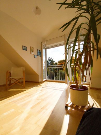 eines der Zimmer im DG