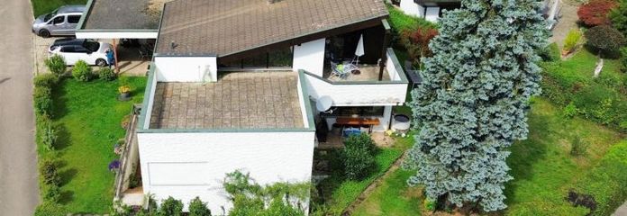 Außergewöhnliches Architektenhaus mit Galerie, Einliegerwohnung + großer Dachterrasse