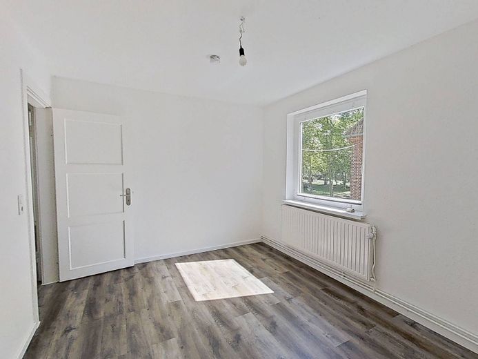 Moderne 2-Zimmer-Wohnung mit Wannenbad in ruhiger Wohnlage – Ansicht II: Schlafzimmer I