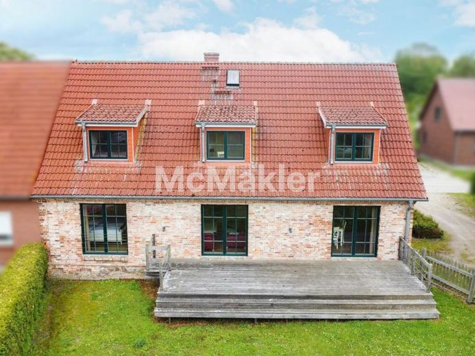 Zeitlose Eleganz trifft ländliche Idylle: Exklusive Doppelhaushälfte mit traumhaftem Grundstück – Foto 1