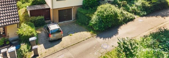 IMMORath.de – Zweifamilienhaus in naturnaher Lage mit großzügigem Grundstück