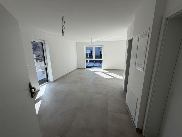 Primera ocupación exclusiva de obra nueva – Elegante vivienda dúplex de 3 habitaciones – Wohnungseingang