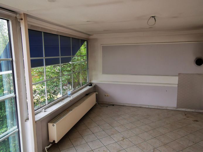 Wohnzimmer EG mit Kaminanschl.