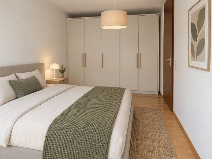 3-Zi-Gartenwohnung mit Terrasse und TG – ab sofort frei – KI Schlafzimmer innen
