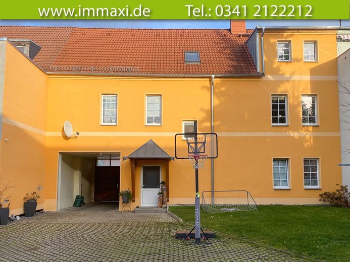 GEPFLEGTES MEHRFAMILIENHAUS MIT 3 WOHNUNGEN (VERMIETET) mit 4,99 % RENDITE – Hausansicht-Rückseite
