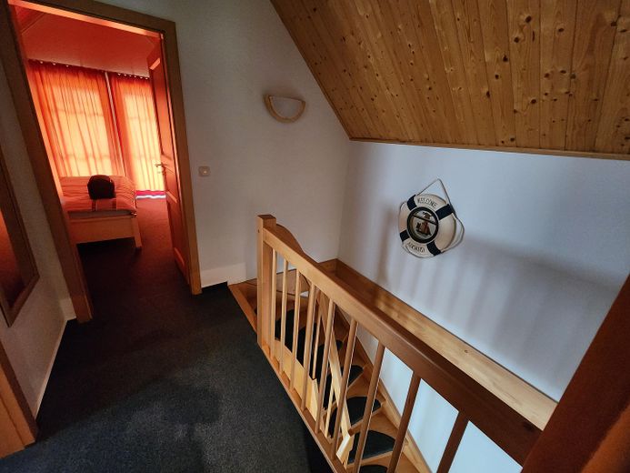 Ferienhaus mit eigenem Bootsliegeplatz – Treppenhaus