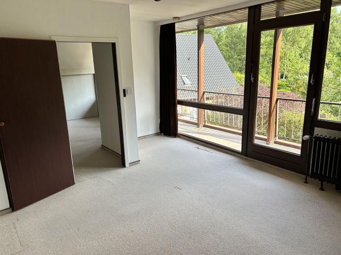 Schlafzimmer mit Balkonzugang