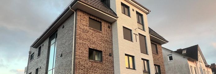 Modern 2-room apartment with terrace – Wohnung unten links 