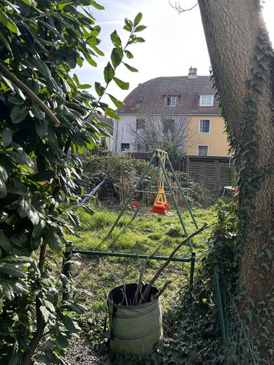 Reihenmittelhaus mit Altbaucharakter und Garten in LU-Mundenheim – Blick auf Gemeinschaftsgarten