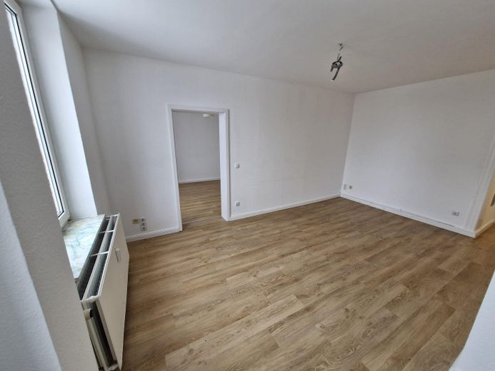 Wohnzimmer mit Küche