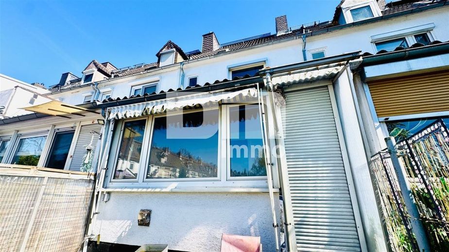 (R)eserveerd! Compact rijtjeshuis op een prominente locatie met tuin – Rückansicht