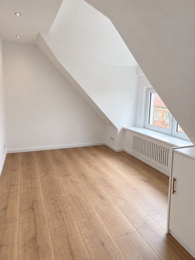 Schledehausen-3-Zimmer Dachgeschosswohnung 2.OG – Wohnzimmer