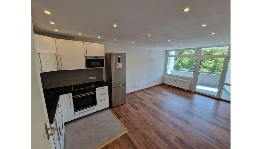 Wohnzimmer mit Küche