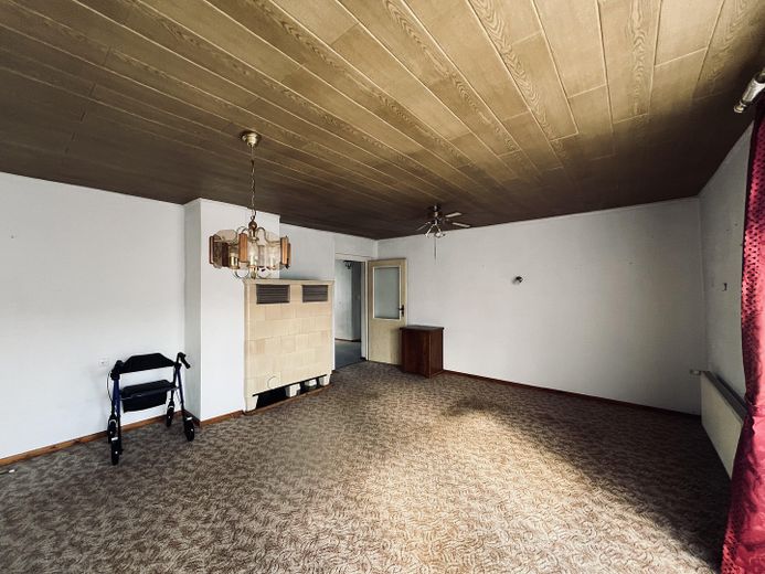 Budynek mieszkalny – Wohnzimmer EG mit Kachelofen