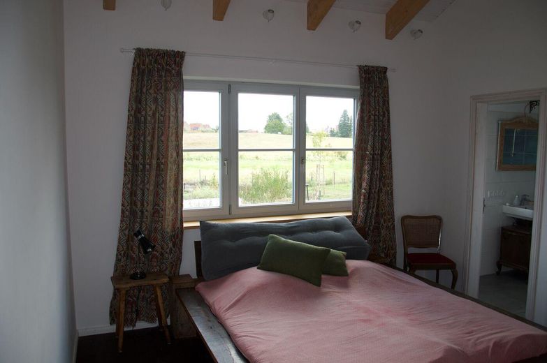 Haus am See mit Gründach – Schlafzimmer
