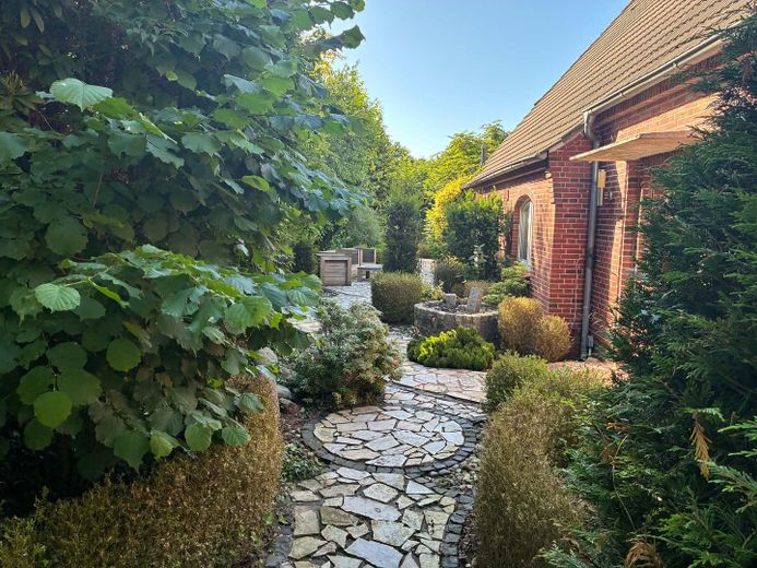 Exclusive detached house near Norddeich with pool, sauna, horse keeping – Garten