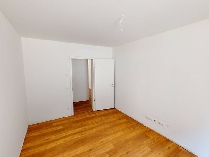 Helle 4-Zimmer-Wohnung mit EBK, 2 BÄDERN und TERRASSE im Neubauquartier FIELD 4 – Ansicht II: Schlafzimmer I