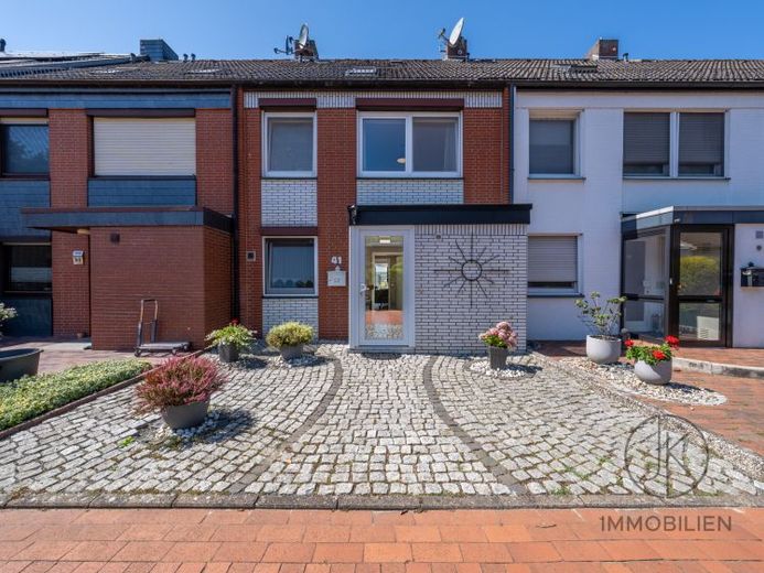 ***Family favorite in Bremen-Kattenesch – spacious living with garden and garage – Photo 1