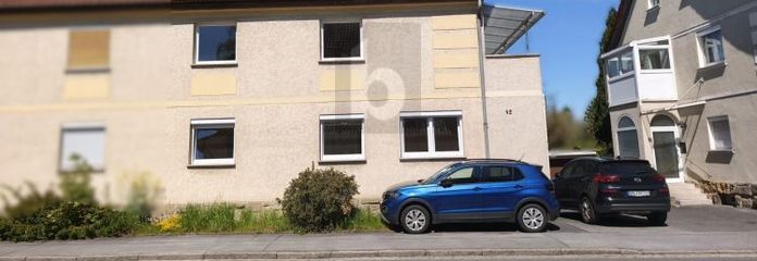WOHNEN UND VERMIETEN MIT GARTEN UND GARAGE