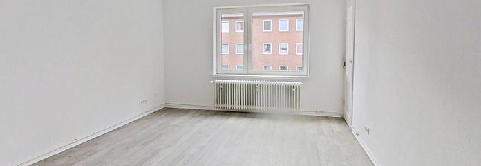 Die Blätter fallen, Ihre Miete auch: Helle 3-Zimmer-Wohnung mit Balkon – Ansicht I: Wohnzimmer
