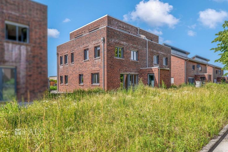 Neubau-Erstbezug Moderne 3-Zimmer-Erdgeschosswohnung mit Terrasse &amp; Stellplatz – Außenansicht