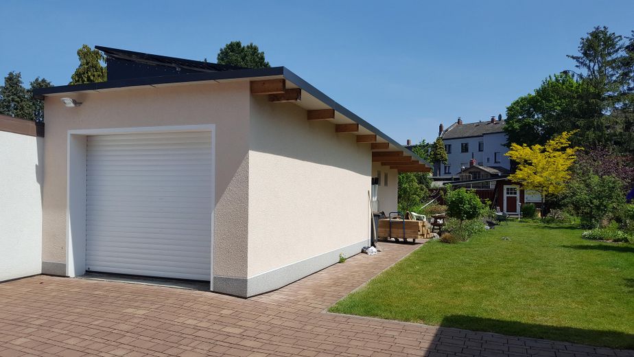 L(i)ebenswertes Haus, Grundstück mit Seele, vereinen zukunftsorientierte Technik mit Natur in Herten – Garage +angrenzendem Holzlager