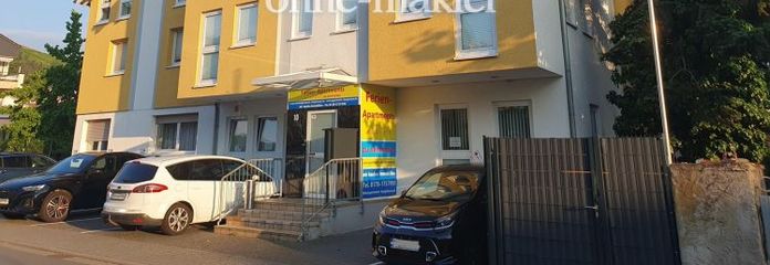 Bestehendes Apartmenthaus mit Baugenehmigung für ein 6-Familienhaus an der Bergstraße