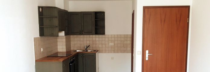 Wohnzimmer mit Küche