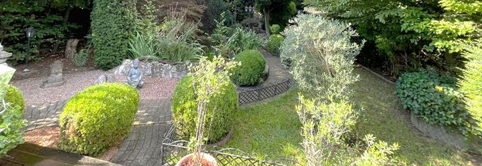 Drei Einheiten, ein außergewöhnliches Anwesen in sehr guter Lage – Wohnen, Arbeiten & Vermieten! – Gartenanlage 