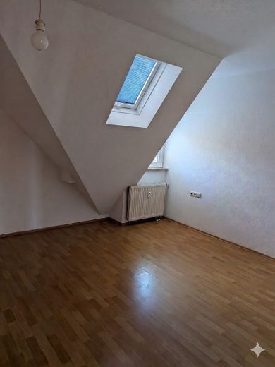 Schlafzimmer mit Dachfenster