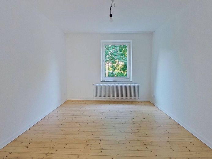 Gemütliche 2-Zimmer-Erdgeschosswohnung mit modernem Wannenbad und viel Lichteinfall – Ansicht I: Schlafzimmer