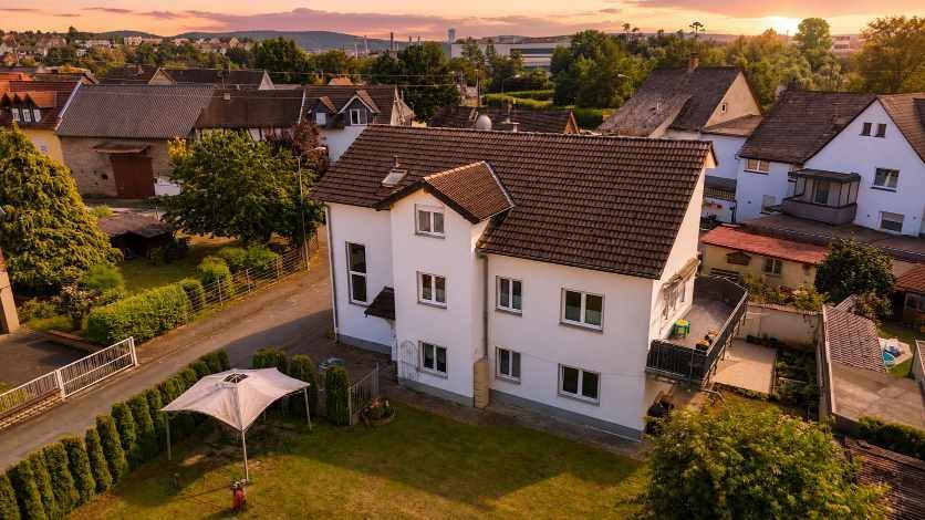 Rendite trifft Wohnkomfort: Nachhaltiges Dreifamilienhaus für Ihre Altersvorsorge – Aussenbild 2