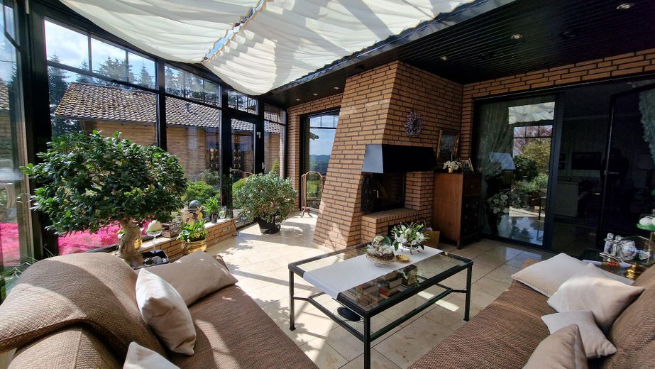 Wintergarten mit Kamin