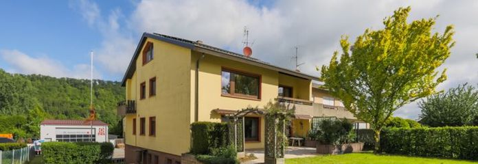 Solid two-family house with great plot in a prime location!