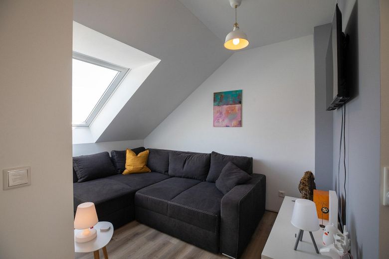 Reihenendhaus KfW 55 mit Wintergarten in Langenfeld – Gästebereich Studio