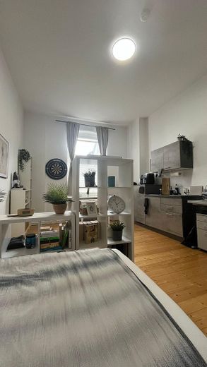 Charmante 1-Zimmer-Altbauwohnung direkt am Kurpark in Bad Oeynhausen – Wohnbereich