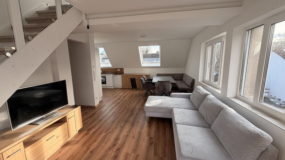 Wohnung im idyllischen Grün in einer Top-Lage. Erstbezug!! – Wohnzimmer
