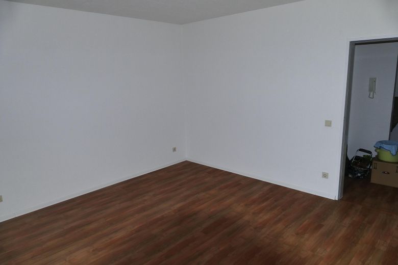 Dachgeschosswohnung mit Weitblick – Wohnzimmer