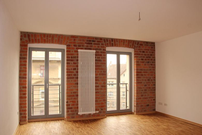 Abitare con stile in una casa a risparmio energetico – Radiator im Wohnzimmer