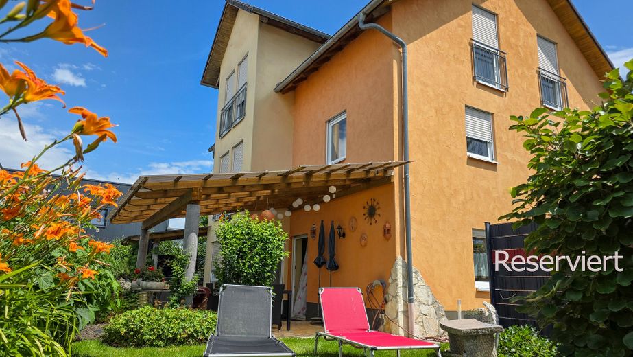 Außergewöhnliches Wohn- und Geschäftshaus mit mediterranem Flair – Gartenansicht 