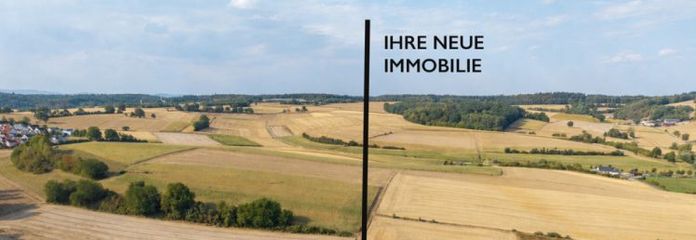 ATIK: Wohnen mit Weitblick: Freistehendes Einfamilienhaus in Aussichtslage mit zwei Wohnebenen