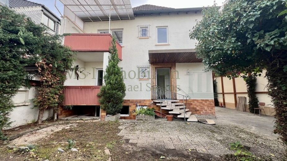 ** Charmantes Einfamilienhaus in zentraler Lage in Lampertheim - viel Platz für die ganze Familie ** – Hausansicht 4