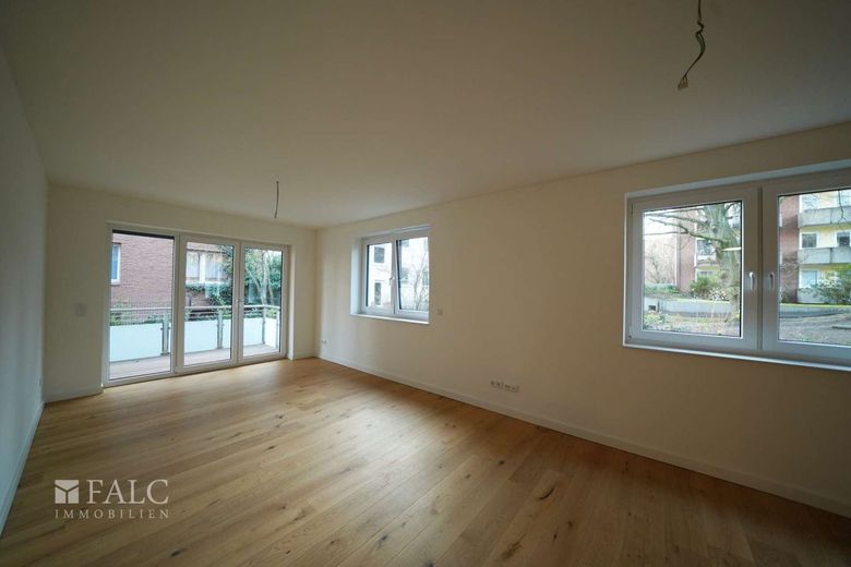 Energieeffizienter Neubau mit 3 Wohneinheiten und Business-Suite – WHG1-Wohnzimmer