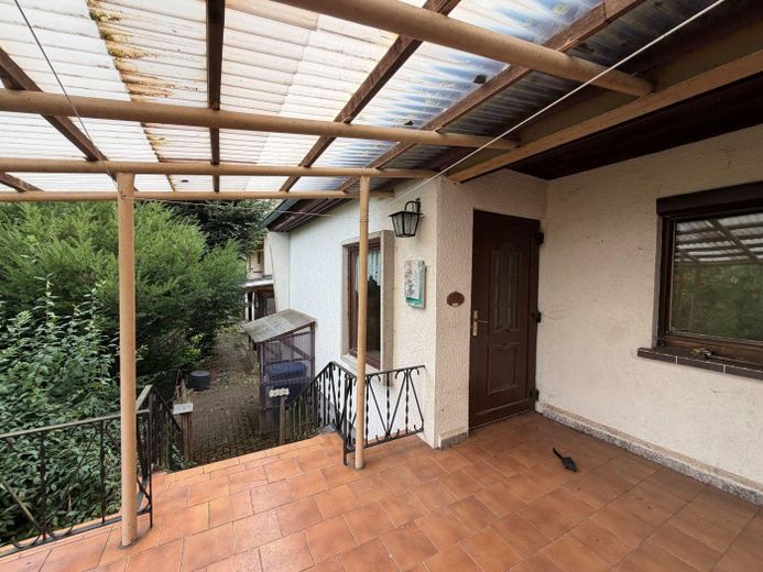 Mieszkanie wśród zieleni w Wehd – Bungalow-> Blick zu Haupthaus