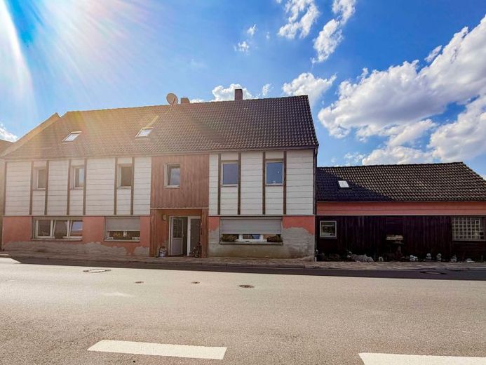 Kein Haus von der Stange – 591 m² Grundstück & jede Menge Möglichkeiten – Photo 1
