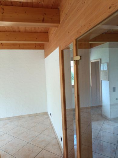 Einzigartiges Holzhaus im Grünen in Randlage und doch zentral – Foto 46