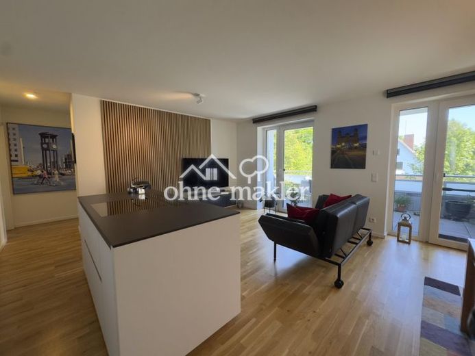 Penthouse au dernier étage en retrait avec vaste espace de vie, balcon et prestations haut de gamme – Photo 1