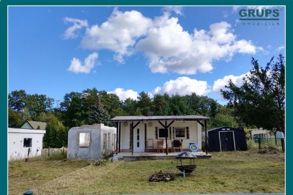 In vendita terreno da giardino recentemente urbanizzato con bungalow in muratura a Krauschwitz
