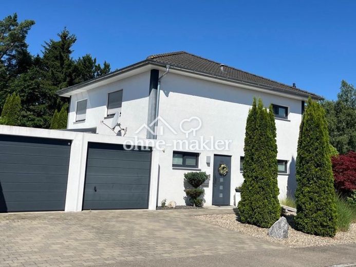Modernes Einfamilienhaus mit Wintergarten, Doppelgarage und liebevoll angelegtem Garten in Schwendi – Foto 1
