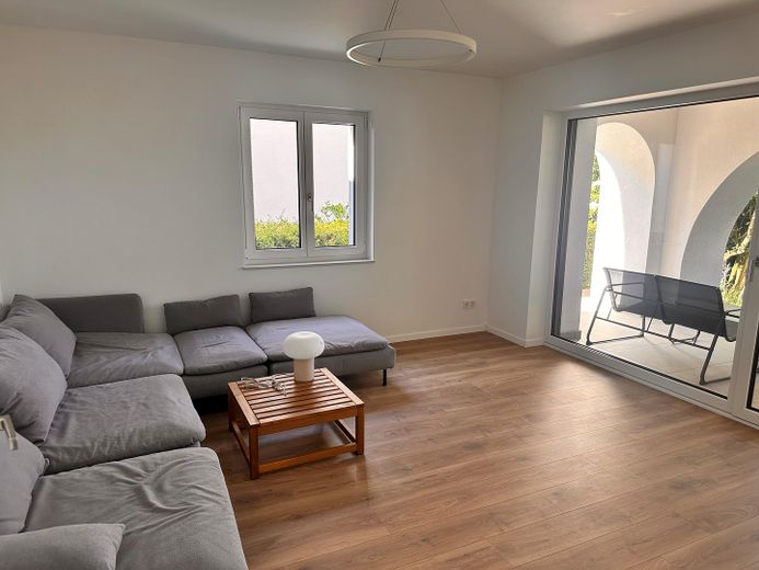 Exklusive Designvilla mit Panoramablick+Einliegerwohnung – Luxus, der Maßstäbe setzt – UG Wohnzimmer